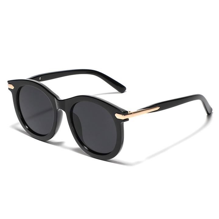 Women's fashionable sunglasses with transparent frame and golden accents Bowlift