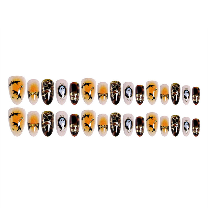 Artificial nails with Halloween motifs and glitter details Bowlift