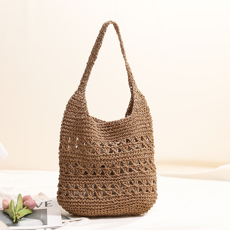 Crocheted shoulder bag with decorative hole pattern Bowlift