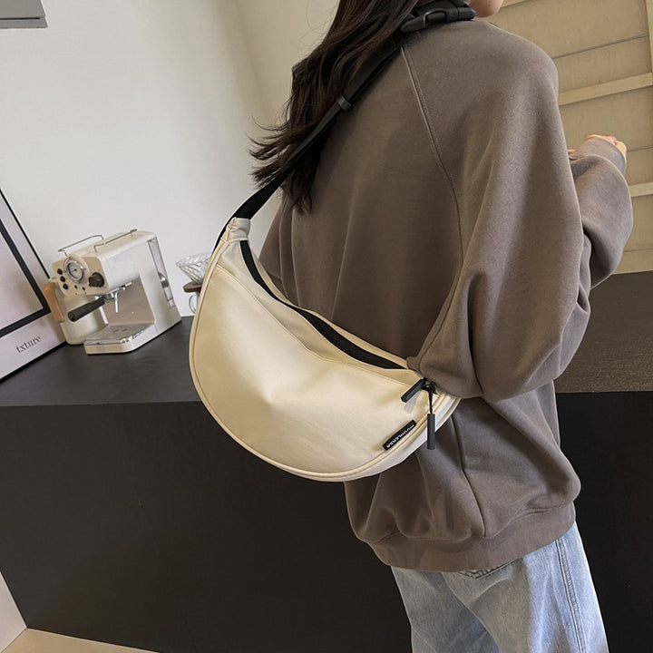 Shoulder bag with adjustable strap and multiple compartments Bowlift