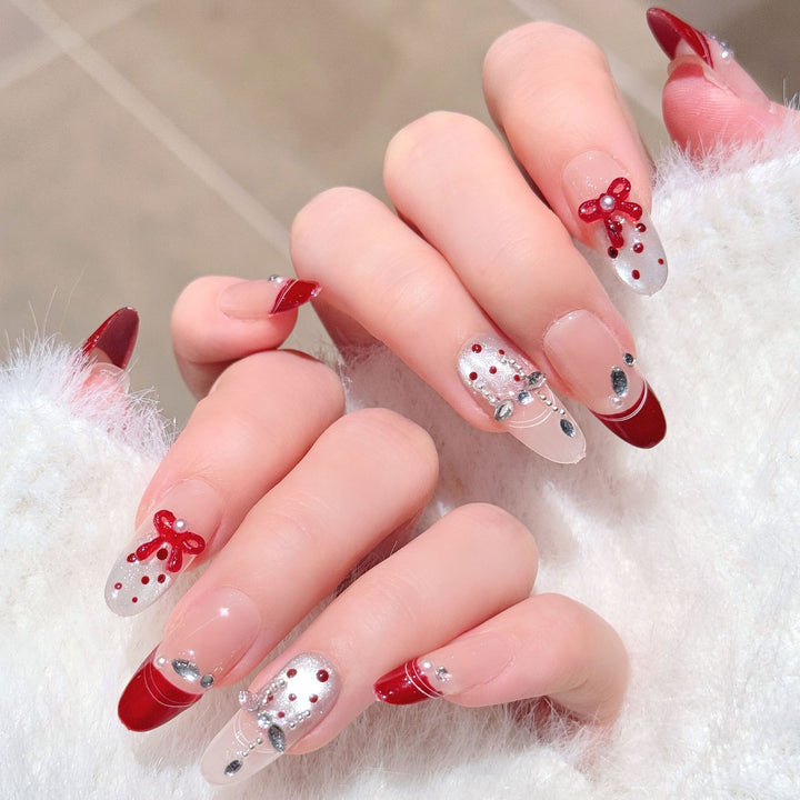 Artistic Press-On Nail Extensions with Gem Accents Bowlift