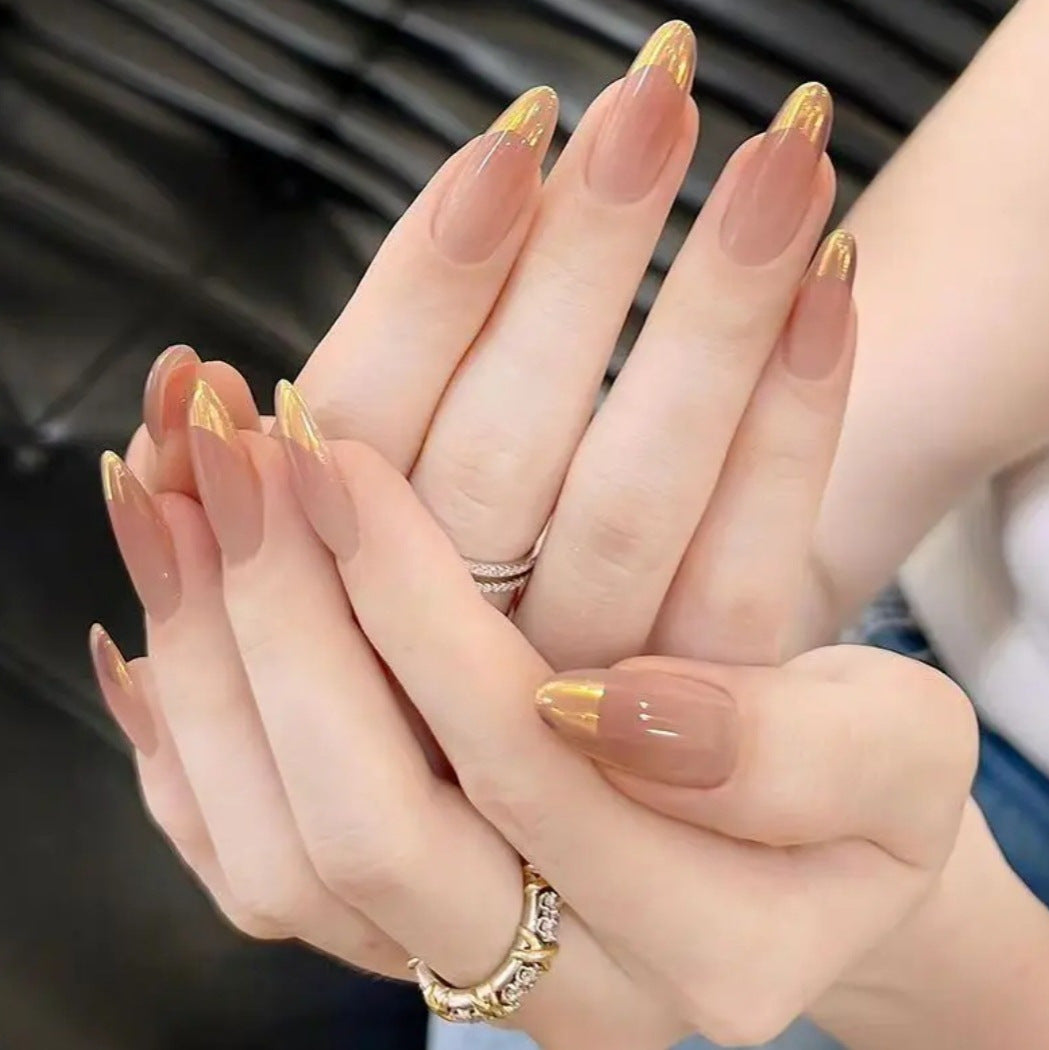 Nail art with elegant gradient and metallic accents Bowlift