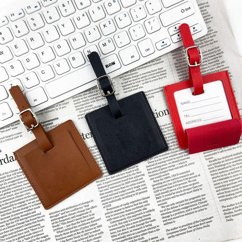 Premium leather luggage tag with adjustable buckle strap and protective ID card sleeve Bowlift