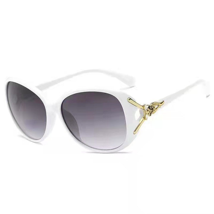 Ladies elegant oversized sunglasses with golden accents Bowlift
