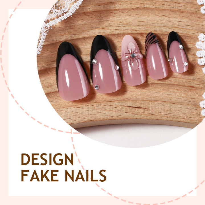 Acrylic nail set with elegant glitter and flower accents Bowlift