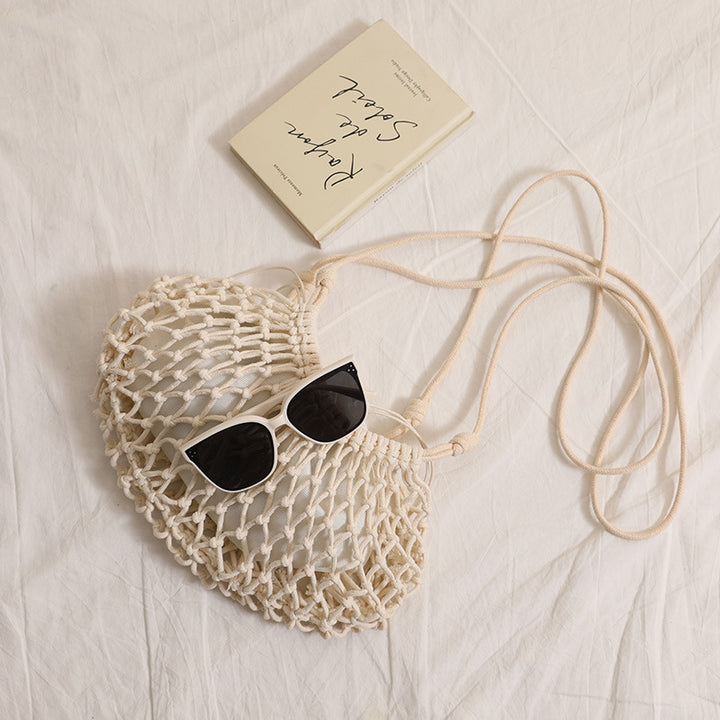 Fine macrame crossbody bag with reinforced carrying strap Bowlift