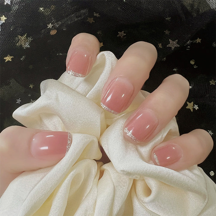 Glamorous artificial nails with delicate flower and glitter effects Bowlift
