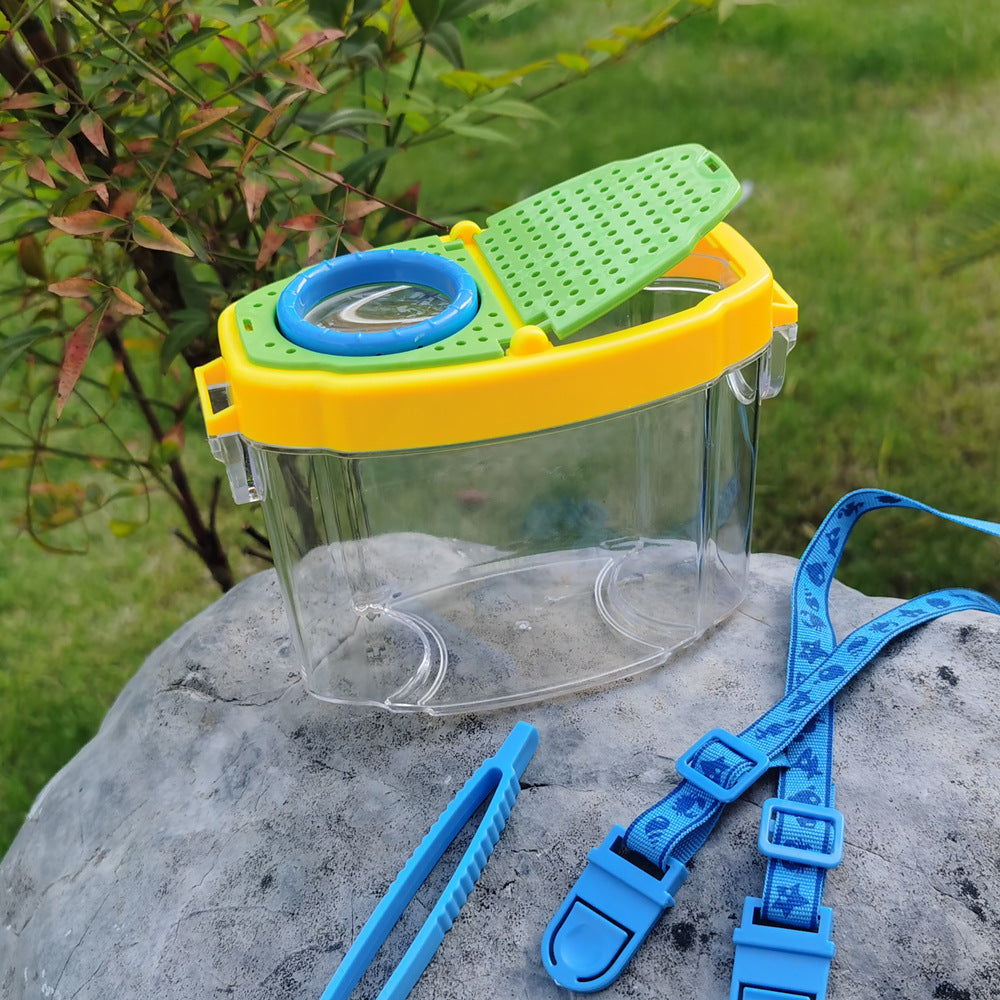 Unisex storage toy with magnifying glass Bowlift