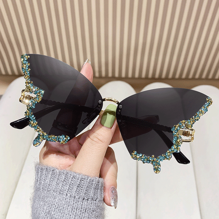 Women's extravagant sunglasses with sparkling butterfly design Bowlift