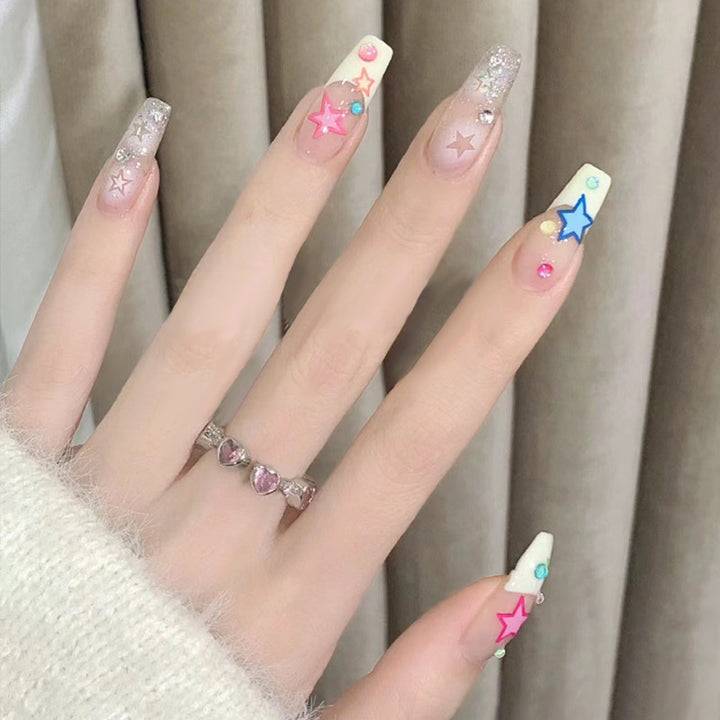 Artificial nails with heart accent and glamorous decorations Bowlift