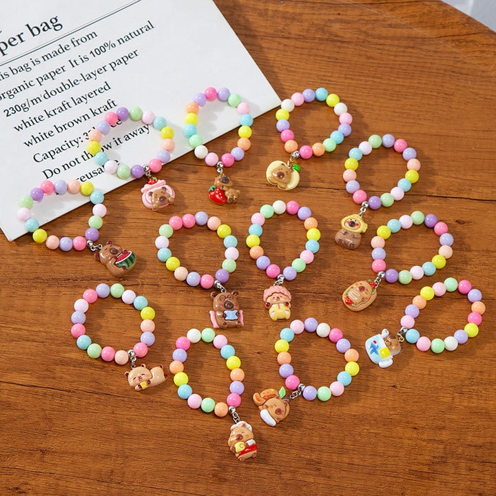 Colorful children's bracelet with crafted pendant Bowlift