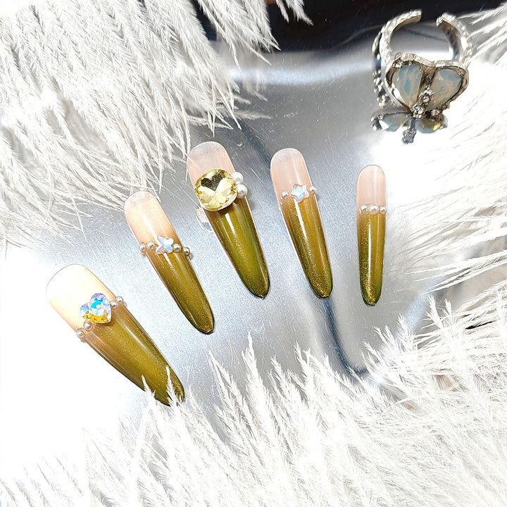 Artificial nails with Elegant Ombre Effect and Glitter Accents Bowlift
