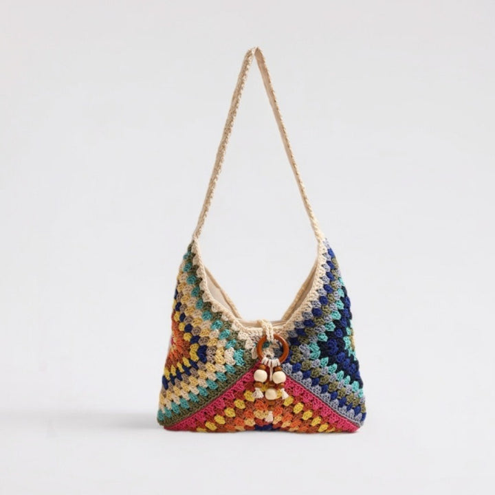 Handmade macrame shoulder bag with playful pendant Bowlift
