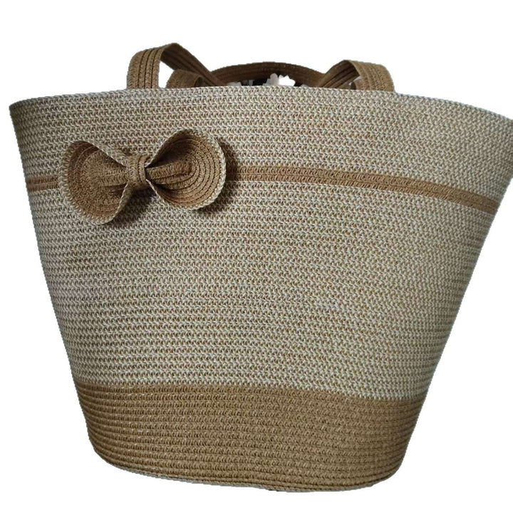 Elegant straw bag with decorative bow closure Bowlift