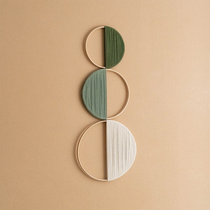 Modern wall art piece made of macrame and wood