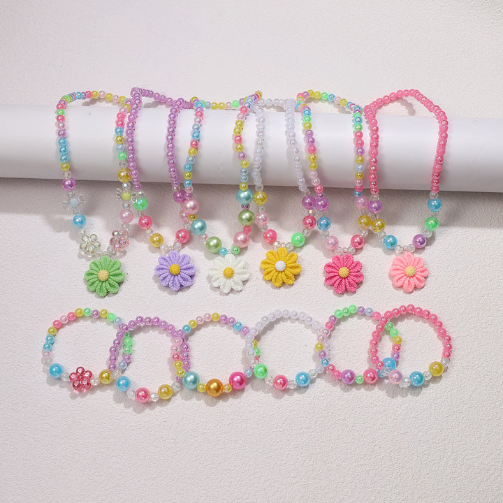 Playful jewelry set with flower pendant Bowlift