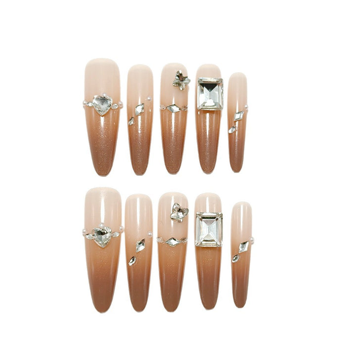 Artificial Nails in Sparkling Stiletto Style with Luxurious Accents Bowlift