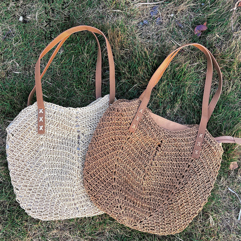 Casual bag made of handwoven straw with wide leather handles Bowlift