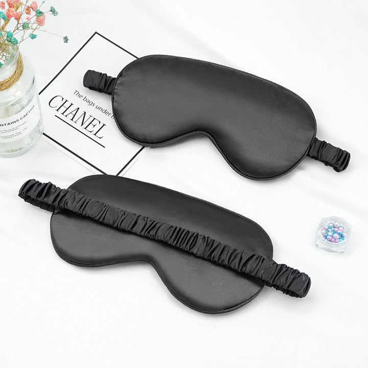 Women's breathable satin eye mask with ergonomic curvature, soft padding and gathered anti-slip band Bowlift