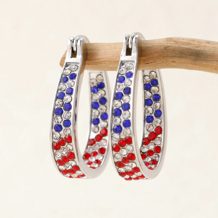 Ladies nano curved clip-on earrings with dense rhinestone embellishment and polished metal alloy Bowlift