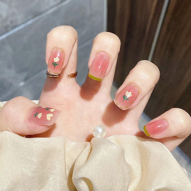 Artistic nail extensions with floral accents Bowlift