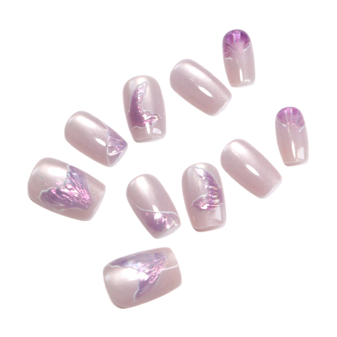 Artfully designed nail extensions with elegant flower motifs Bowlift