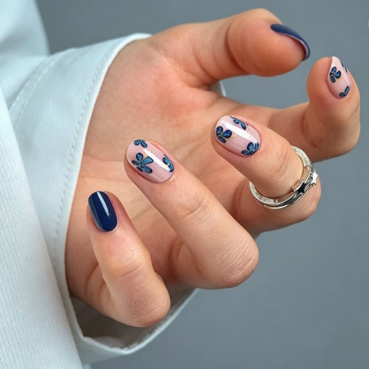 Artificial nails set with floral designs and shine finish Bowlift