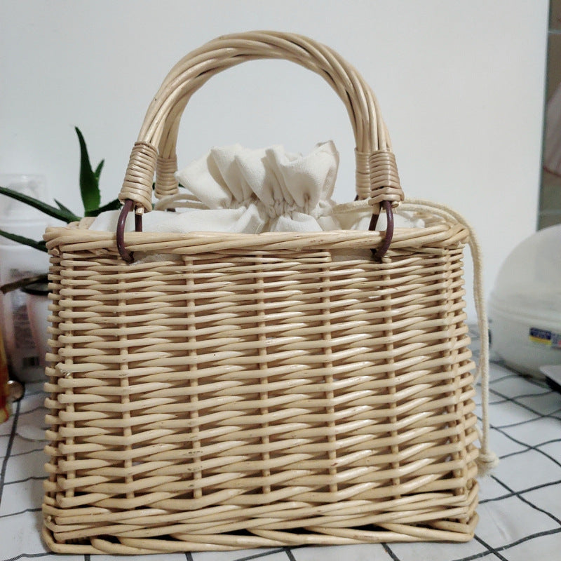 Women's handbag made of braided material with cotton drawstring closure Bowlift