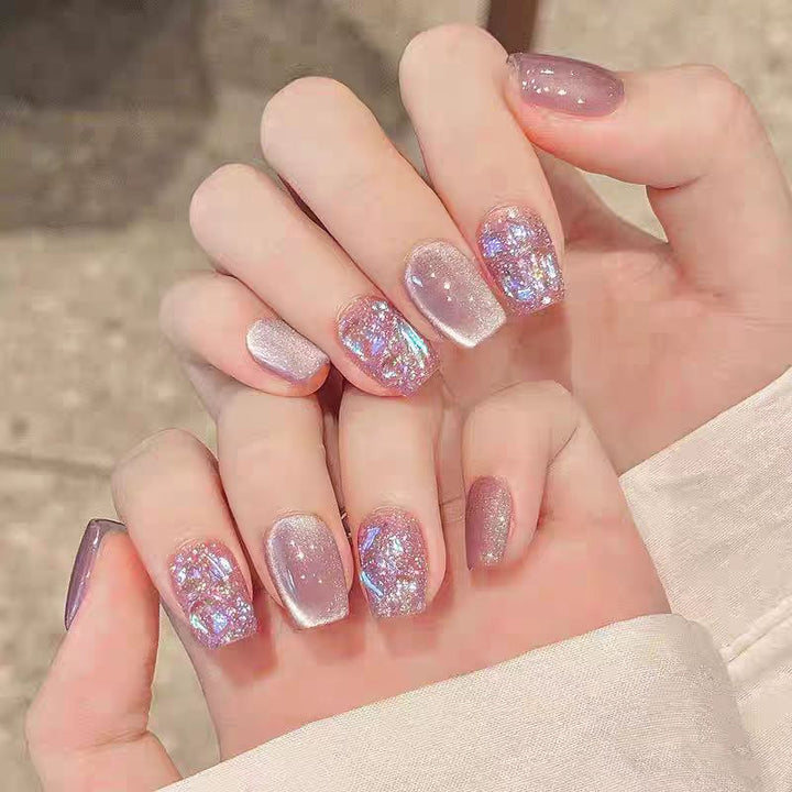 Artificial nails with sparkling glitter and holographic effect Bowlift