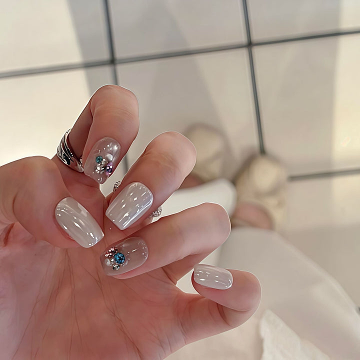 Artificial nails with elegant jewelry accents Bowlift