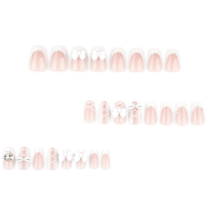 Artful Nail Art with Bows and Rhinestone Decorations Bowlift