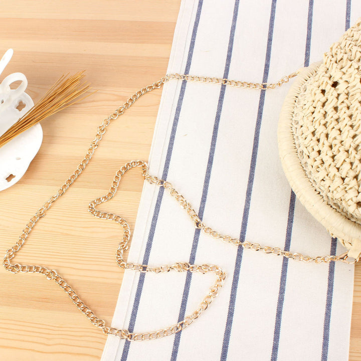Shoulder bag made from handcrafted natural fibers with elegant chain decoration Bowlift