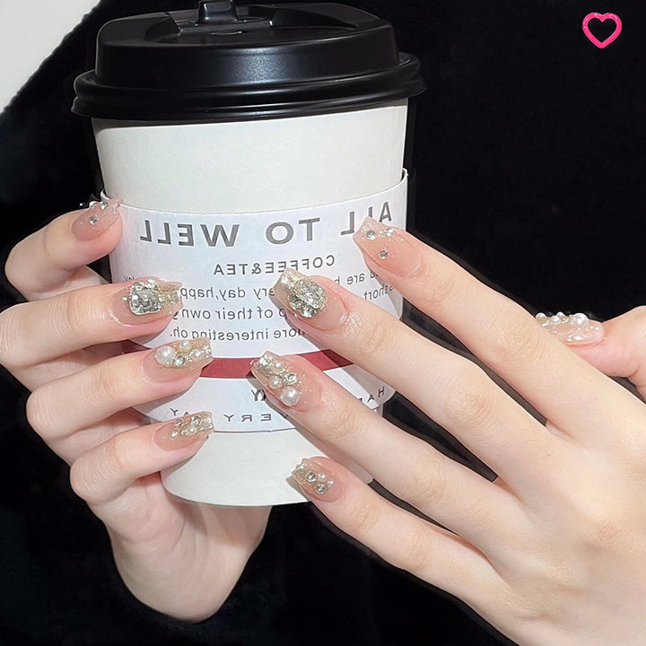 Artificial nail set with elegant pearl and glitter design Bowlift