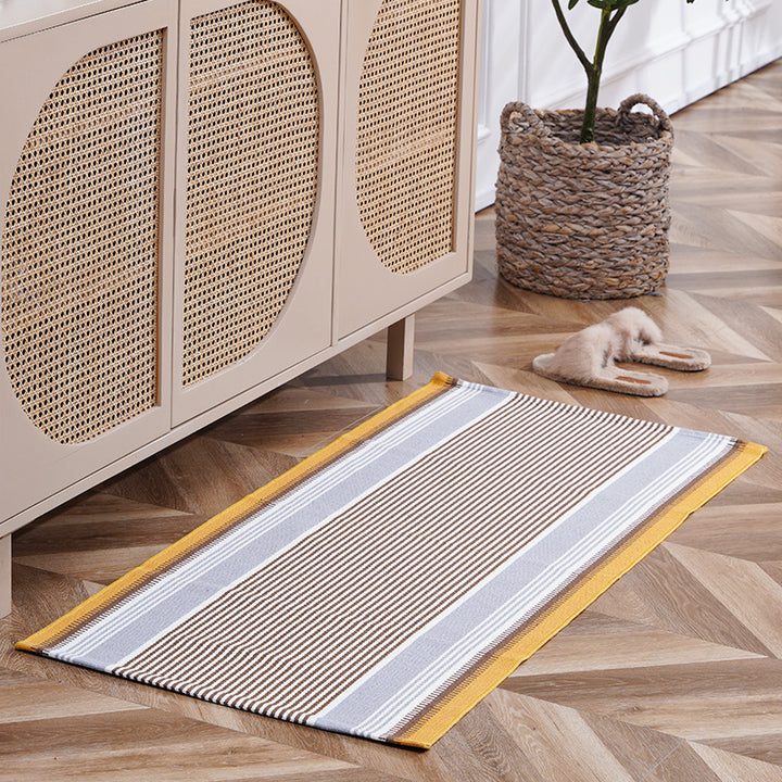woven living room runner with fringes and geometric weave pattern