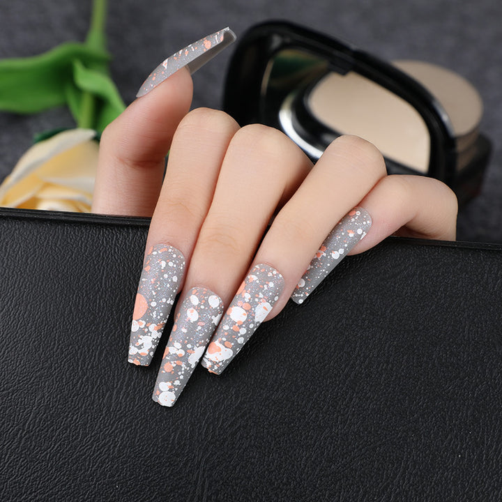 Artistic splatter design artificial nails Bowlift