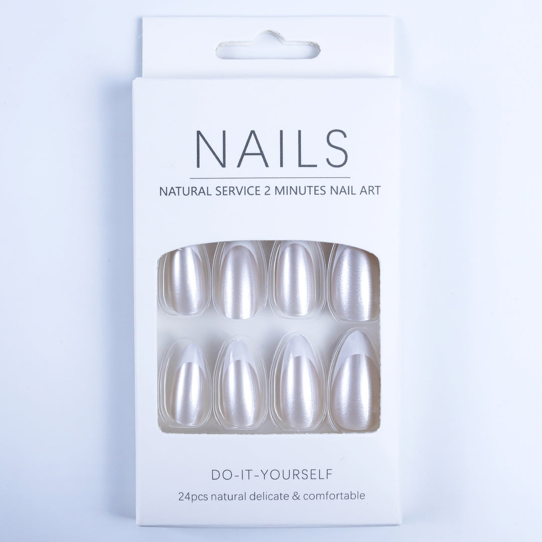 Artificial nails in elegant French tip design Bowlift