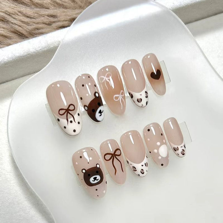 Artificial nails with animal and flower motifs Bowlift