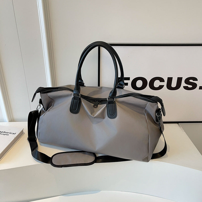 Elegantly Designed Travel Bag with Multifunctional Interior Compartments Bowlift