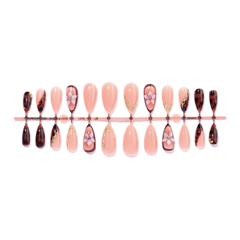 Artificial nail set with elegant floral decor and glitter elements Bowlift