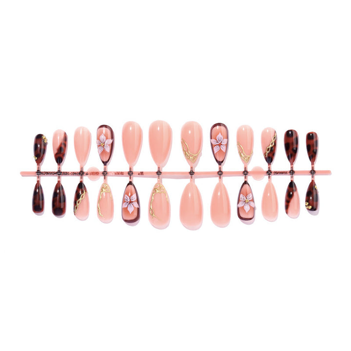 Artificial nail set with elegant floral decor and glitter elements Bowlift