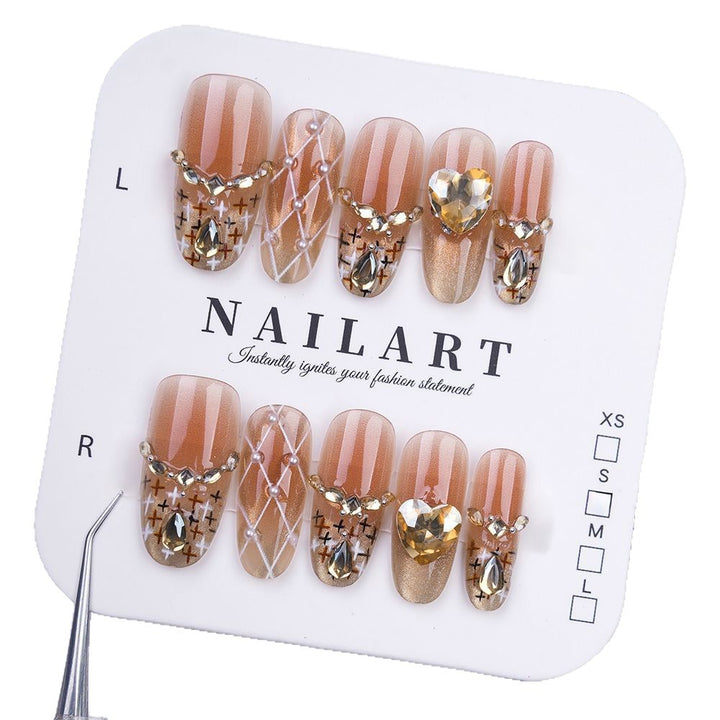 Artificial nails with glitter and heart accents Bowlift