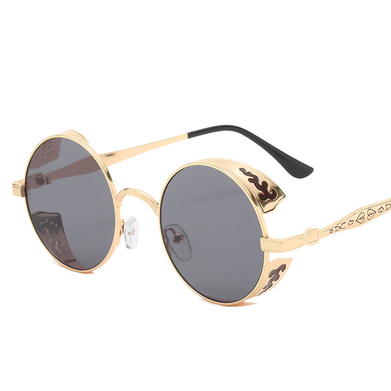 Ladies round sunglasses with luxurious gold frame and decorative elements Bowlift
