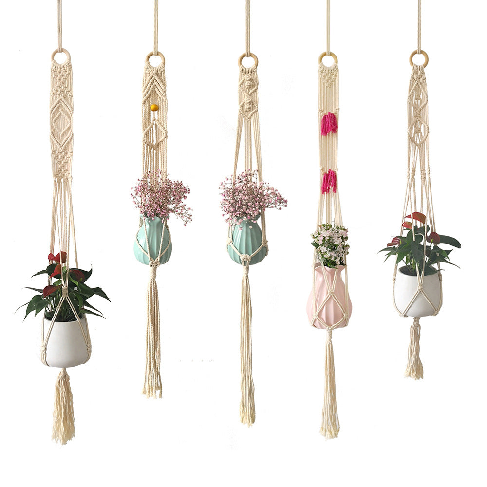 Macrame plant hanger with decorative tassels