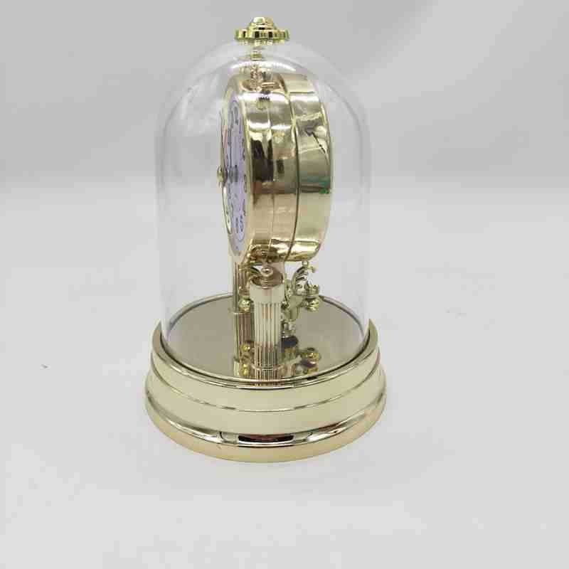 Classic table clock in elegant glass case Bowlift