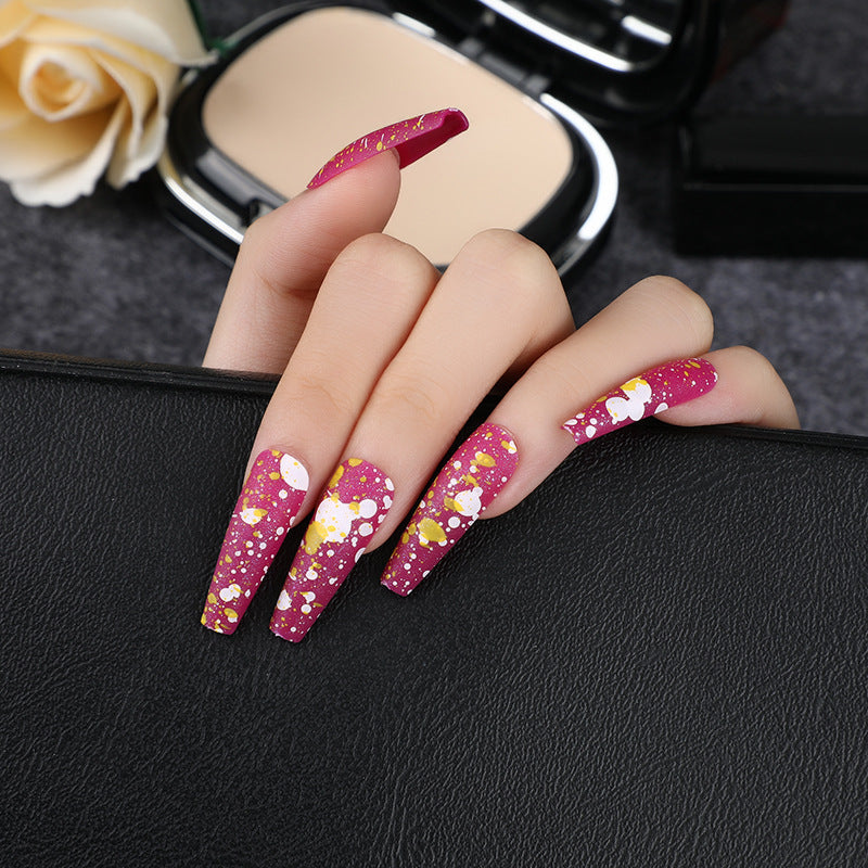 Artistic splatter design artificial nails Bowlift
