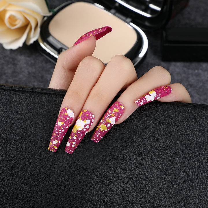 Artistic splatter design artificial nails Bowlift