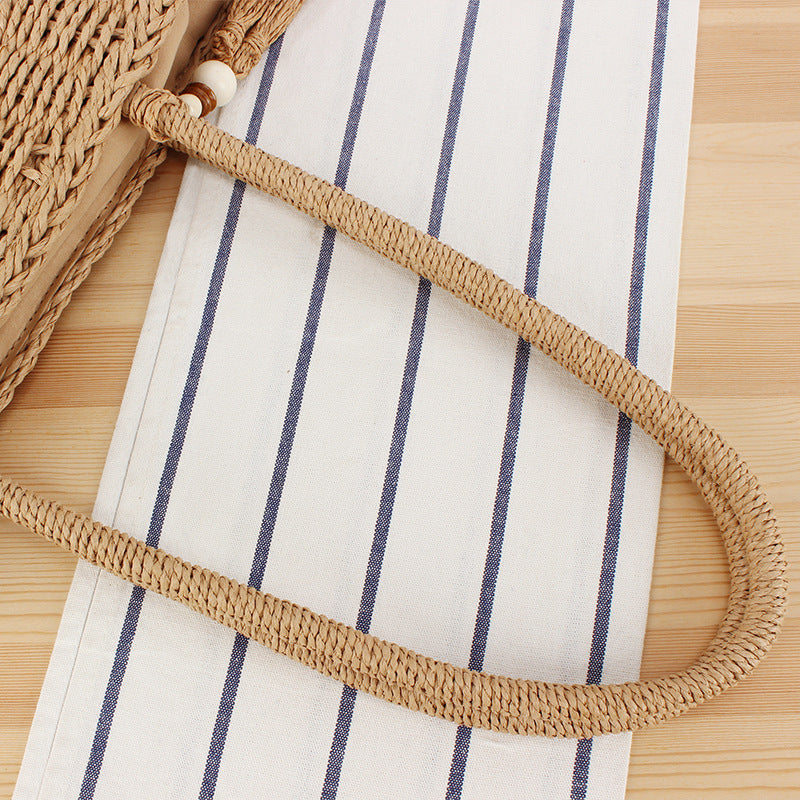 Hand-knotted shopping bag made of natural weave with elegant tassel decoration Bowlift