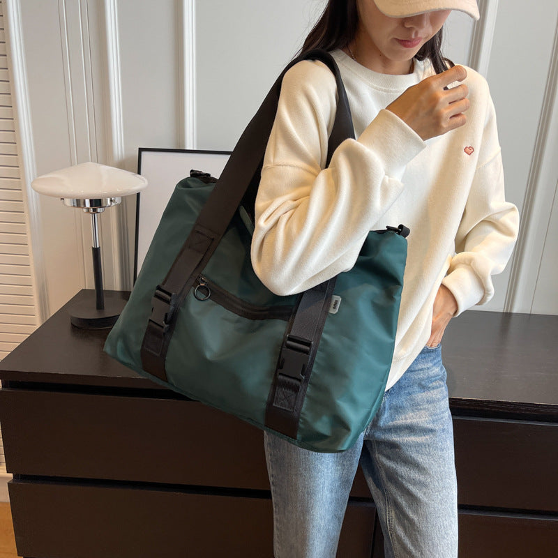 Spacious sports duffel bag with ergonomic carrying handles and water-repellent material Bowlift