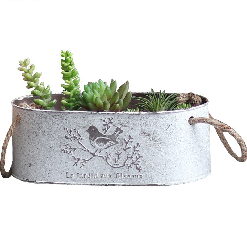 Decorative storage basket made of metal with natural design Bowlift