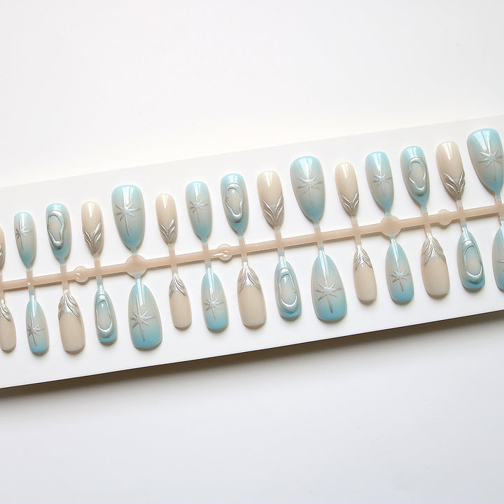 Artistic Press-On Nail Art Set with Silver Accents Bowlift